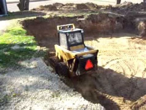 digging basement with skid steer|digging holes with skid steer.